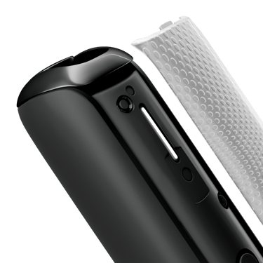 Close-up of Jet Black Augmented Pattern Ploom AURA front panel, detached from device.
