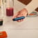 The sleek Ploom AURA Navy Blue deviceis a discreet companion always with you
