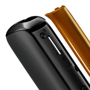 Close-up of Mango Sorbet Ploom AURA front panel, detached from device.
