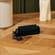 Ploom AURA Jet Black Solo Carry Case accessory on a table
