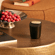 Ploom Large Stick Tray standing on a brown table