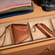 Ploom AURA Rose Gold Solo and Duo Carry Case accessories in a drawer
